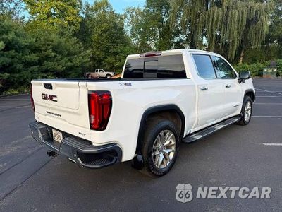 Trzecie zdjęcie samochodu z tyłu: 2019 GMC SIERRA K1500 SLT VIN:3GTU9DEDXKG296248 - miniatura