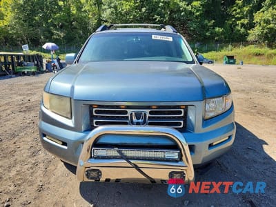 Piąte zdjęcie samochodu w środku: 2006 HONDA RIDGELINE RTL VIN:2HJYK16536H565591 - miniatura