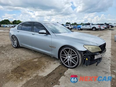 Czwarte zdjęcie samochodu z boku: 2014 BMW 740 LI VIN:WBAYE4C50ED138749 - miniatura