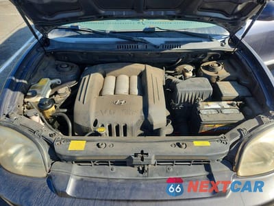 Zdjęcie 12 z 13 samochodu: 2005 HYUNDAI SANTA FE GLS VIN:KM8SC13D05U874557 - miniatura