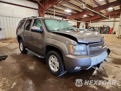 Czwarte zdjęcie samochodu z boku: 2011 CHEVROLET TAHOE K1500 LT VIN:1GNSKBE0XBR400080 - miniatura