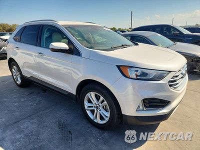 Czwarte zdjęcie samochodu z boku: 2019 FORD EDGE SEL VIN:2FMPK4J91KBB00487 - miniatura