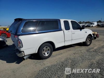 Trzecie zdjęcie samochodu z tyłu: 1999 FORD F150 VIN:1FTRX17W4XKA37649 - miniatura