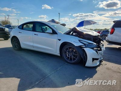 Czwarte zdjęcie samochodu z boku: 2023 TESLA MODEL 3 VIN:5YJ3E1EA8PF384529 - miniatura