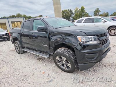 Czwarte zdjęcie samochodu z boku: 2018 CHEVROLET COLORADO VIN:1GCGTBENXJ1121118 - miniatura