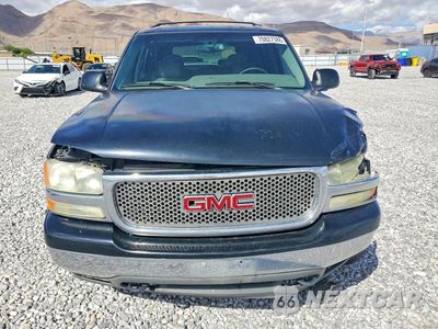 Piąte zdjęcie samochodu w środku: 2002 GMC YUKON VIN:1GKEC13T22R295369 - miniatura