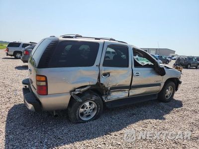Trzecie zdjęcie samochodu z tyłu: 2002 CHEVROLET TAHOE C1500 VIN:1GNEC13V52R315327 - miniatura