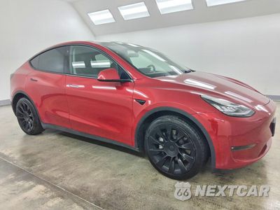 Czwarte zdjęcie samochodu z boku: 2022 TESLA MODEL Y VIN:7SAYGDEE4NF481263 - miniatura