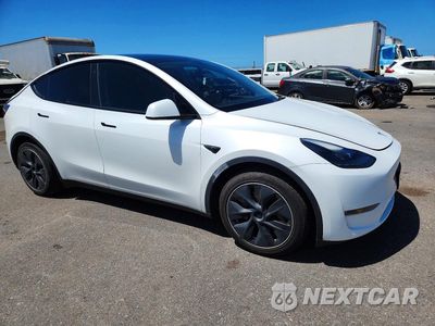 Czwarte zdjęcie samochodu z boku: 2023 TESLA MODEL Y VIN:7SAYGAEE2PF627919 - miniatura