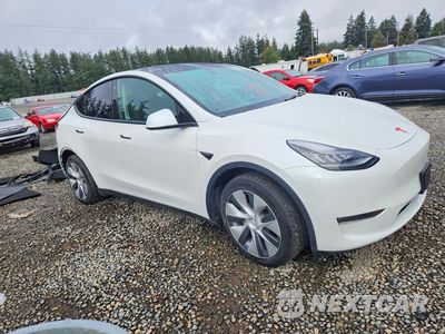 Czwarte zdjęcie samochodu z boku: 2021 TESLA MODEL Y VIN:5YJYGDEE6MF094287 - miniatura