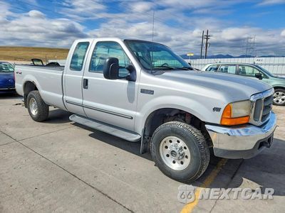 Czwarte zdjęcie samochodu z boku: 1999 FORD F250 SUPER DUTY VIN:1FTNX21S3XED89615 - miniatura
