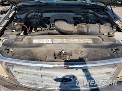 Zdjęcie 11 z 12 samochodu: 2000 FORD F150 VIN:1FTRX17L4YNB61846 - miniatura
