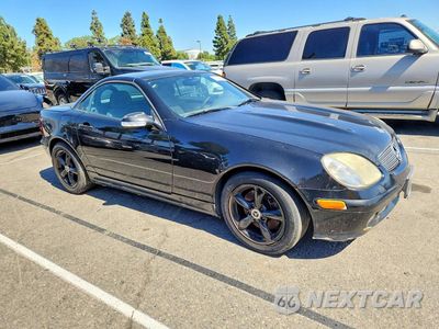 Czwarte zdjęcie samochodu z boku: 2003 MERCEDES-BENZ SLK 320 VIN:WDBKK65F43F276104 - miniatura
