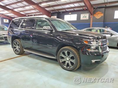 Czwarte zdjęcie samochodu z boku: 2015 CHEVROLET TAHOE K1500 LTZ VIN:1GNSKCKCXFR642331 - miniatura