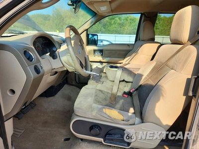 Zdjęcie 7 z 13 samochodu: 2004 FORD F150 VIN:1FTPX14504FA32486 - miniatura