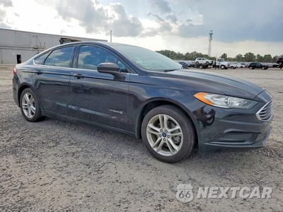 Czwarte zdjęcie samochodu z boku: 2018 FORD FUSION SE HYBRID VIN:3FA6P0LU9JR171048 - miniatura