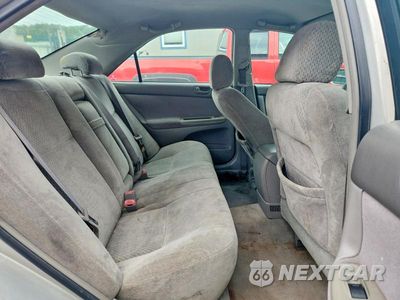 Zdjęcie 10 z 12 samochodu: 2004 TOYOTA CAMRY LE VIN:4T1BE32K64U905279 - miniatura