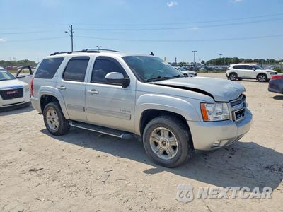 Czwarte zdjęcie samochodu z boku: 2011 CHEVROLET TAHOE K1500 LT VIN:1GNSKBE02BR105278 - miniatura