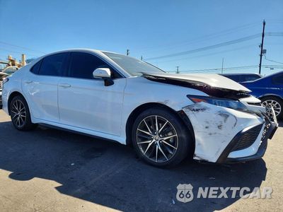 Czwarte zdjęcie samochodu z boku: 2024 TOYOTA CAMRY SE VIN:4T1G11AK0RU884573 - miniatura