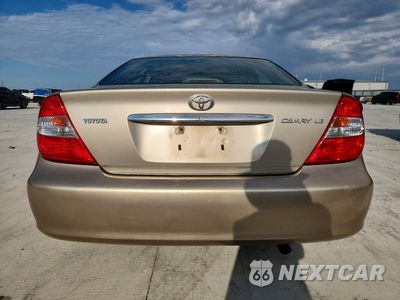 Zdjęcie 6 z 12 samochodu: 2004 TOYOTA CAMRY LE VIN:4T1BE32K44U790309 - miniatura
