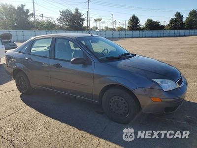 Czwarte zdjęcie samochodu z boku: 2005 FORD FOCUS ZX4 VIN:1FAFP34N35W127140 - miniatura