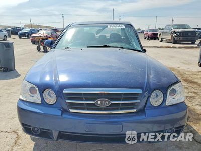 Piąte zdjęcie samochodu w środku: 2005 KIA OPTIMA LX VIN:KNAGD126155417192 - miniatura