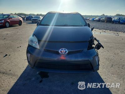 Piąte zdjęcie samochodu w środku: 2014 TOYOTA PRIUS TWO VIN:JTDKN3DU2E1819585 - miniatura