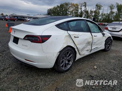 Trzecie zdjęcie samochodu z tyłu: 2022 TESLA MODEL 3 VIN:5YJ3E1EB6NF136401 - miniatura