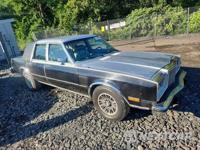 Czwarte zdjęcie samochodu z boku: 1986 CHRYSLER FIFTH AVENUE VIN:1C3BF66P3GX588464 - miniatura