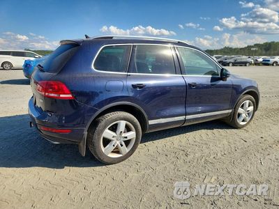 Trzecie zdjęcie samochodu z tyłu: 2014 VOLKSWAGEN TOUAREG V6 TDI VIN:WVGEP9BP1ED014940 - miniatura