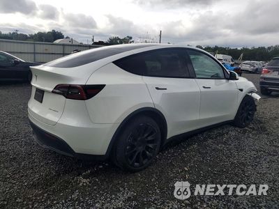 Trzecie zdjęcie samochodu z tyłu: 2024 TESLA MODEL Y VIN:7SAYGDEE9RA258493 - miniatura