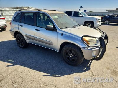 Czwarte zdjęcie samochodu z boku: 2002 TOYOTA RAV4 BASE VIN:JTEGH20V820057978 - miniatura