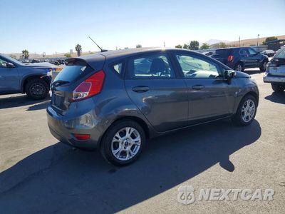 Trzecie zdjęcie samochodu z tyłu: 2015 FORD FIESTA SE VIN:3FADP4EJ9FM208525 - miniatura