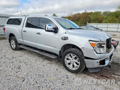 Czwarte zdjęcie samochodu z boku: 2017 NISSAN TITAN XD SL VIN:1N6BA1F45HN550716 - miniatura