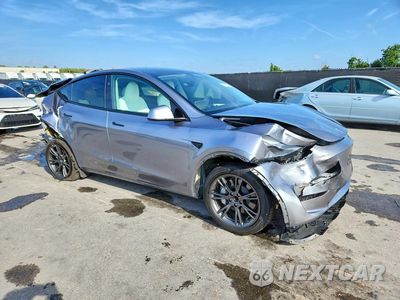 Czwarte zdjęcie samochodu z boku: 2024 TESLA MODEL Y VIN:7SAYGDED1RA313347 - miniatura