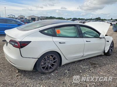 Trzecie zdjęcie samochodu z tyłu: 2022 TESLA MODEL 3 VIN:5YJ3E1EB4NF178064 - miniatura