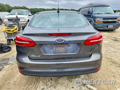 Zdjęcie 6 z 12 samochodu: 2018 FORD FOCUS S VIN:1FADP3E2XJL225735 - miniatura