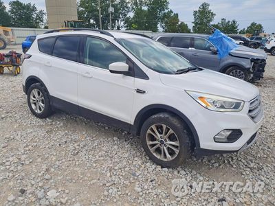 Czwarte zdjęcie samochodu z boku: 2017 FORD ESCAPE SE VIN:1FMCU0G99HUF10563 - miniatura