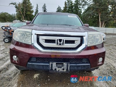 Piąte zdjęcie samochodu w środku: 2011 HONDA PILOT EXL VIN:5FNYF4H59BB010166 - miniatura