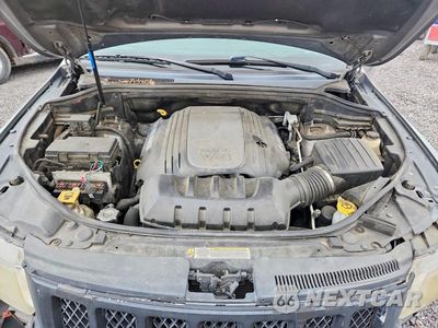 Zdjęcie 11 z 12 samochodu: 2013 JEEP GRAND CHEROKEE OVERLAND VIN:1C4RJECT2DC537917 - miniatura