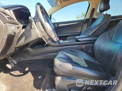 Zdjęcie 7 z 13 samochodu: 2019 FORD FUSION TITANIUM VIN:3FA6P0D93KR124044 - miniatura