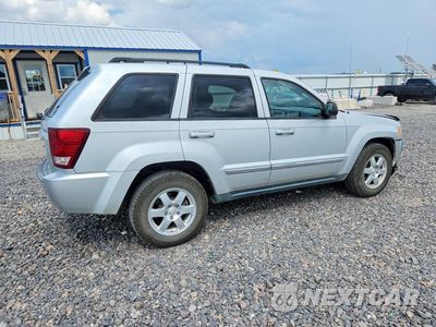 Trzecie zdjęcie samochodu z tyłu: 2010 JEEP GRAND CHEROKEE LAREDO VIN:1J4PR4GK3AC103264 - miniatura