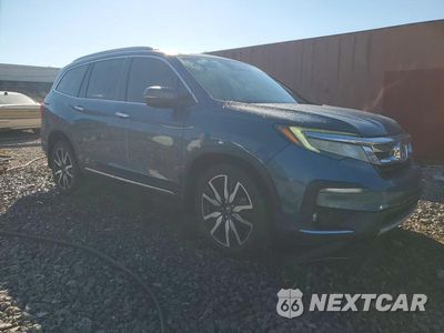 Czwarte zdjęcie samochodu z boku: 2019 HONDA PILOT TOURING VIN:5FNYF6H66KB034929 - miniatura