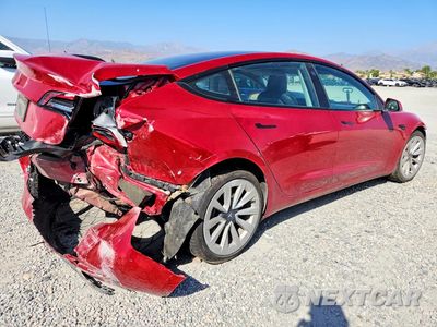 Trzecie zdjęcie samochodu z tyłu: 2023 TESLA MODEL 3 VIN:5YJ3E1EAXPF433469 - miniatura
