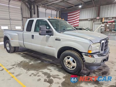 Czwarte zdjęcie samochodu z boku: 2004 FORD F350 SUPER DUTY VIN:1FTWX32P74EB16497 - miniatura