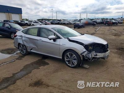 Czwarte zdjęcie samochodu z boku: 2018 HONDA CLARITY TOURING VIN:JHMZC5F33JC011084 - miniatura