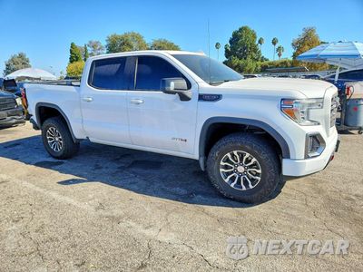 Czwarte zdjęcie samochodu z boku: 2019 GMC SIERRA K1500 AT4 VIN:3GTP9EEL2KG112379 - miniatura