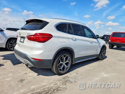 Trzecie zdjęcie samochodu z tyłu: 2017 BMW X1 SDRIVE28I VIN:WBXHU7C32H5H37095 - miniatura