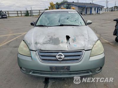Piąte zdjęcie samochodu w środku: 2004 NISSAN ALTIMA 3.5 SE VIN:1N4BL11D74C156358 - miniatura