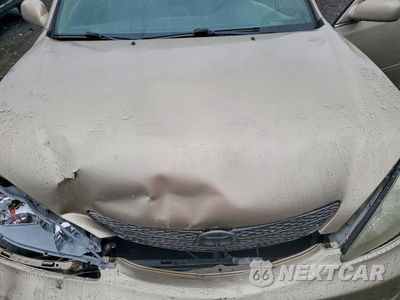 Zdjęcie 11 z 12 samochodu: 2003 TOYOTA CAMRY LE VIN:4T1BE32K33U658611 - miniatura